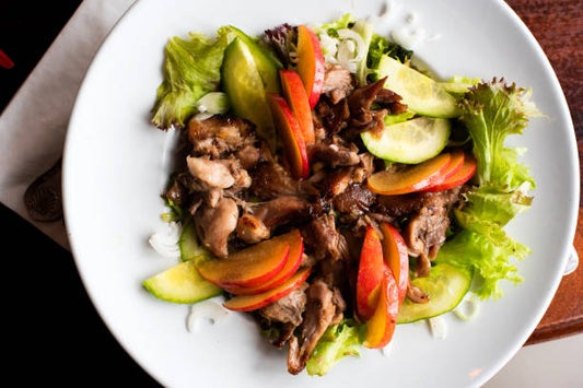 Salade tiède de confit de canard : la recette d’été ultime !